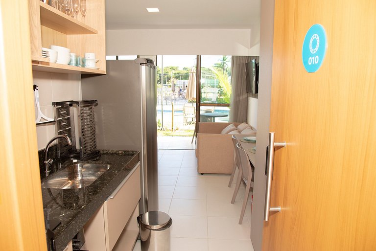 Novo flat Térreo com vista para piscina
