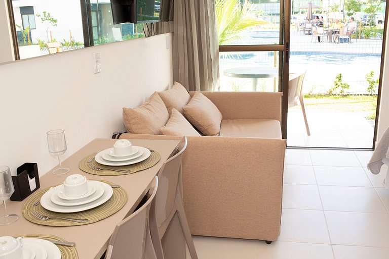 Novo flat Térreo com vista para piscina