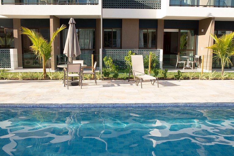 Novo flat Térreo com vista para piscina